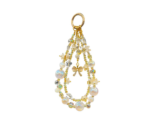 Bracelet Fleur de lait Bloomeliya ivoire, perles nacrées et nœud doré, complet, toutes les rangées attachées