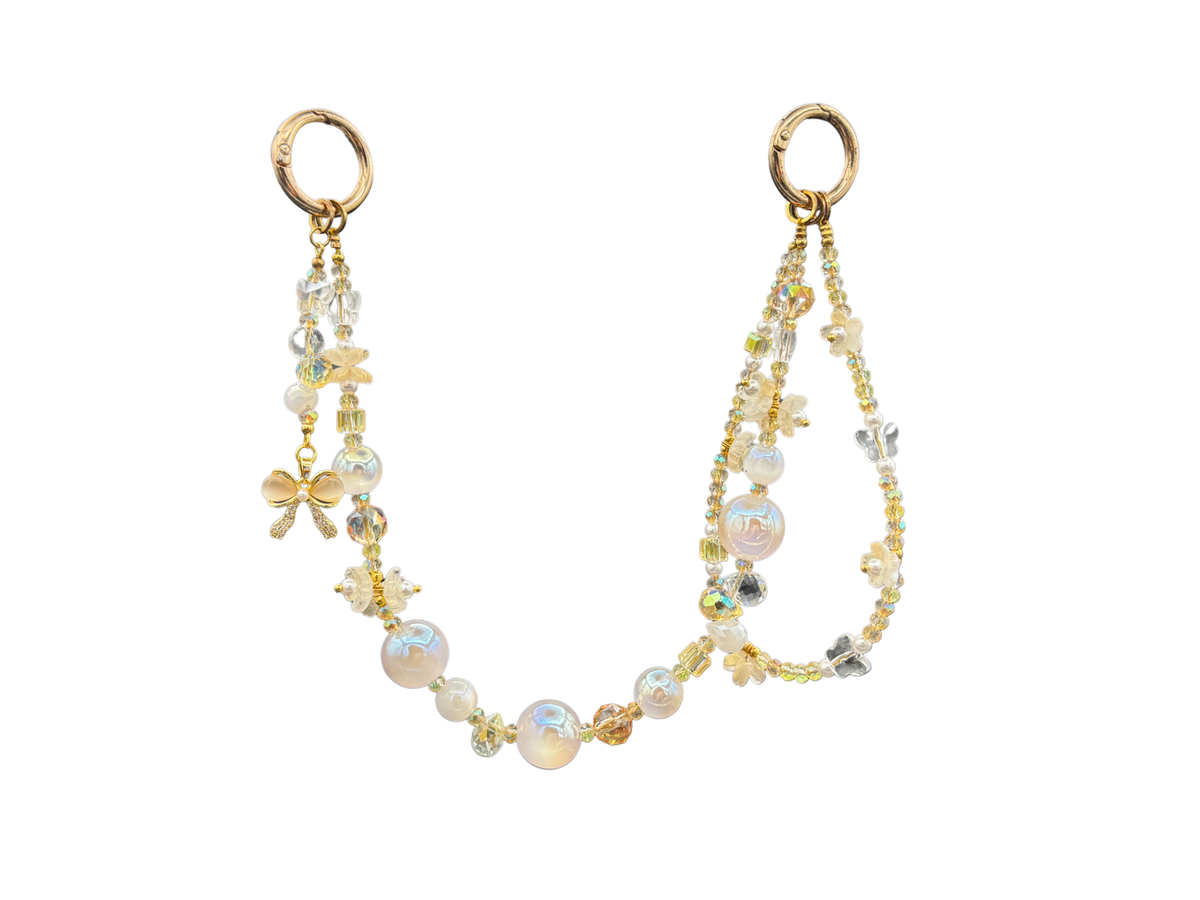 Bracelet Fleur de lait Bloomeliya ivoire, perles nacrées et nœud doré, complet ouvert, rangées détachables