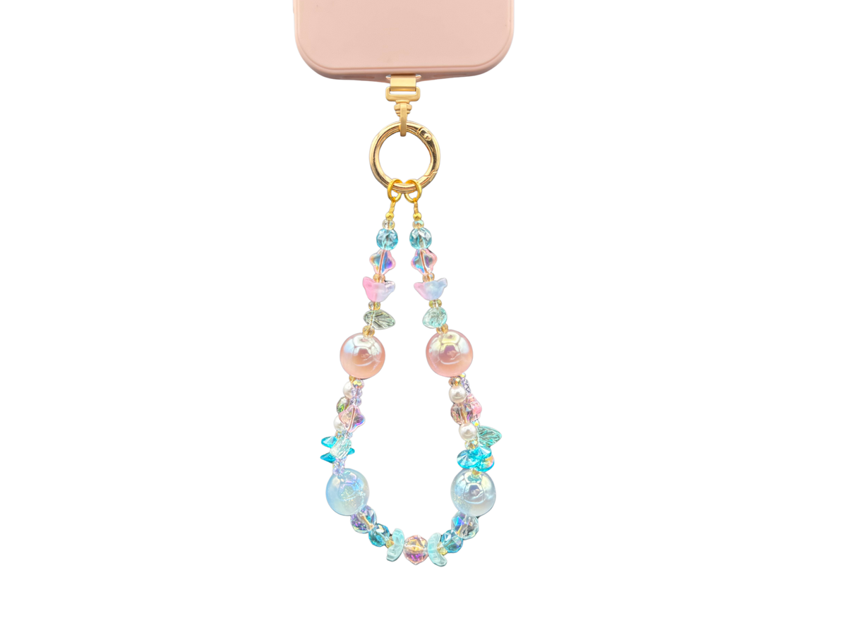 Bracelet Lune d'aquarelle Bloomeliya bleu, pêche et turquoise, 3e rangée seule sur un téléphone