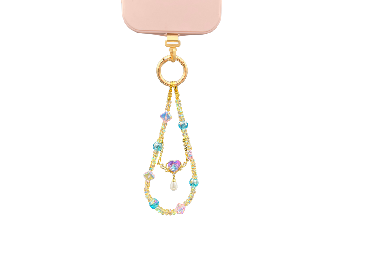 Bracelet Lune d'aquarelle Bloomeliya bleu, pêche et turquoise, 1re rangée seule sur un téléphone